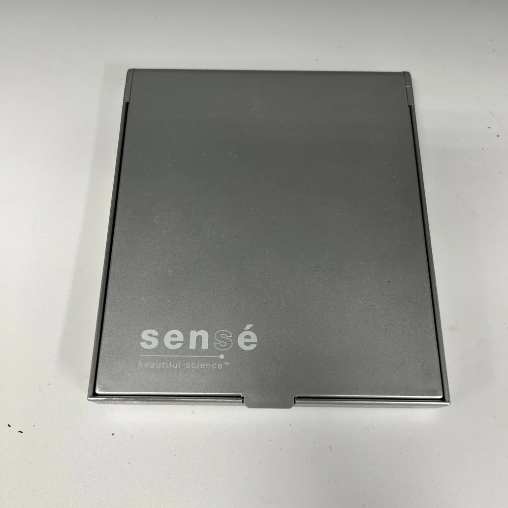 Sensé Beautiful Science compact sleek silver casing built-in mirror